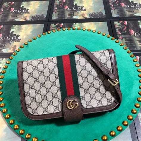 replica gucci hand luggage|gucci knockoff sites.